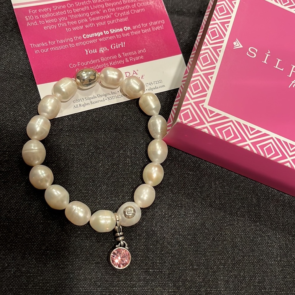 Silpada fresh water pearl and sterling swavorski pink charm.